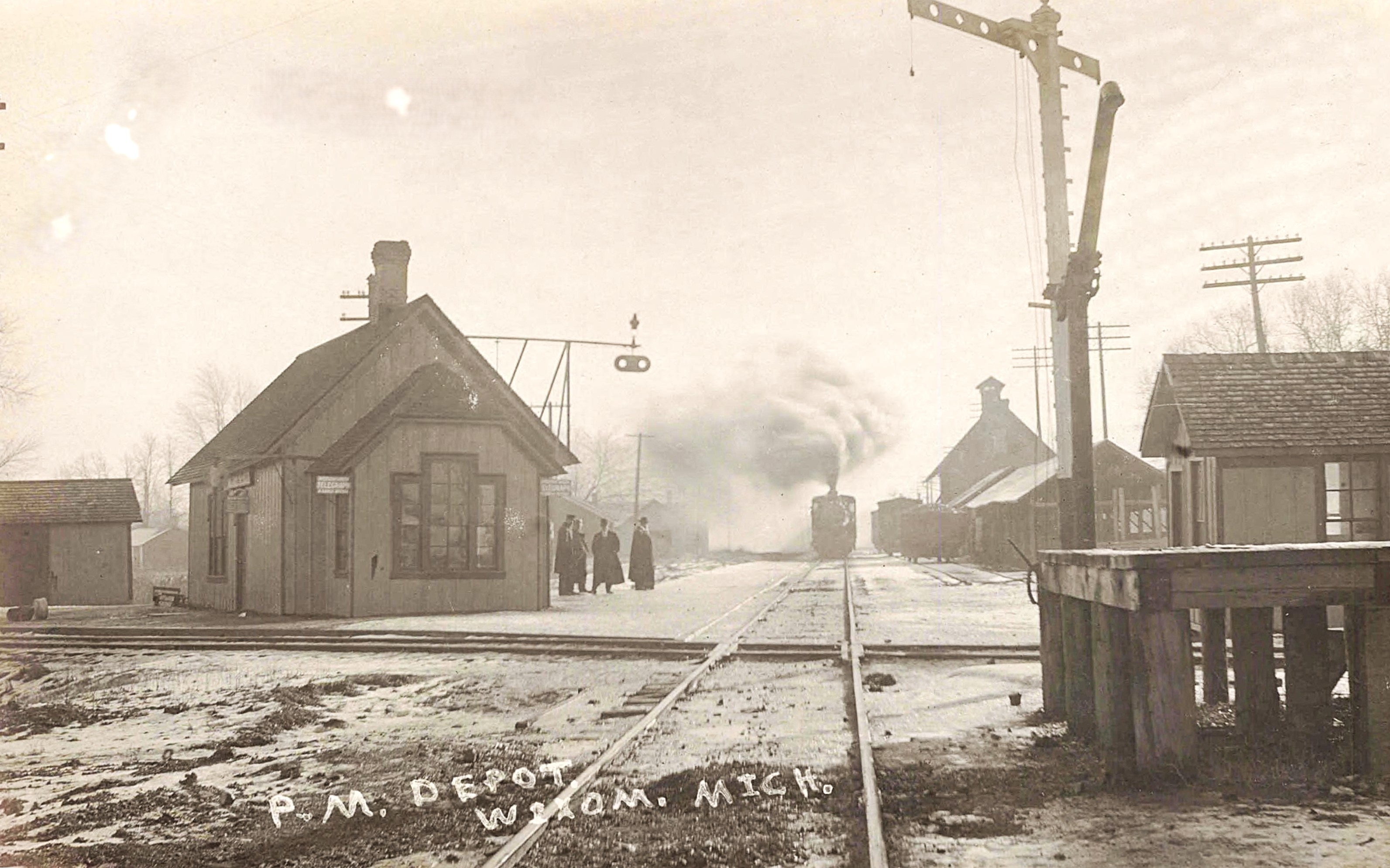 Train approaching Wixom Crossing